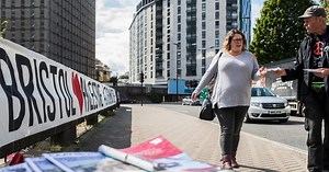 Anti-Arms Trade protesters have encircled Bristol's Bear Pit with banners