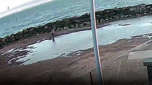 Mother and daughter rescued after sinking waist-deep into quicksand
