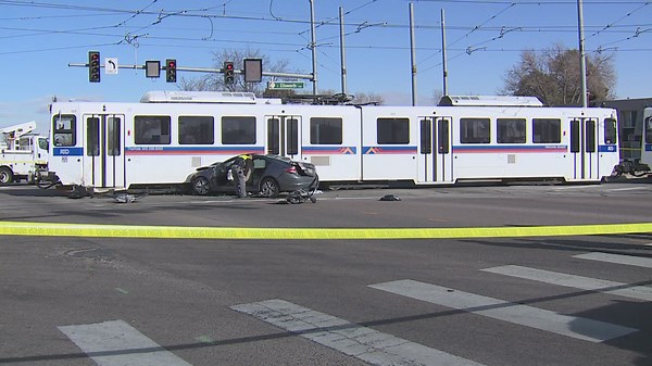 Car fleeing shooting scene crashes into RTD light rail train in Aurora on Christmas morning