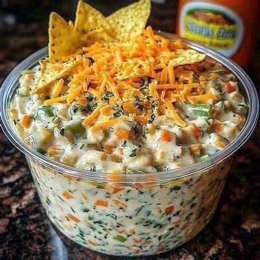 It's called Crack Dip Crack Dip is a flavorful and easy-to-make dip, perfect for parties or game days. It is typically made with a base of cream cheese and sour cream, then mixed with ranch seasoning, shredded cheddar cheese, bacon, and green onions. Here's a basic recipe for crack dip: 16 oz sour cream 1 oz packet ranch dressing mix 3 oz bacon bits 1 cup shredded cheddar cheese 1/4 cup green onions, chopped Combine the ingredients, chill for at least 1-2 hours, and serve with tortilla chips, cr