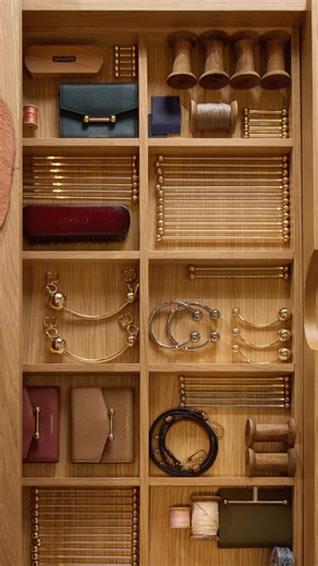 Making the the Music Bar - bringing you up close to the defining detail in the Strathberry collection. Our instantly recognisable hardware inherited its DNA from a vintage leather sheet music folio, discovered by our founders. Today, the music folio sits proudly in our library, alongside other key designs, reminding us of where we started and the beautiful journey we are part of. #strathberry | Strathberry