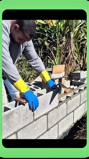 Building a wall using concrete blocks
