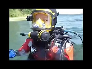 Female Diver is Diving with Rubber Drysuit and OTS Full Face Mask