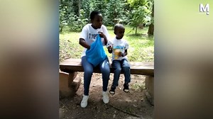 Monkey steals snack from boy in Kenya