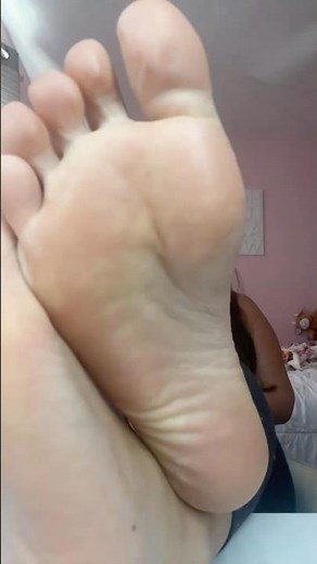 Cheerleader sweaty and stinky soles after a practice