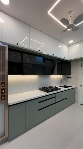 InteriorIllusions.in on Instagram: "✨ Where everyday cooking meets calm, sacred moments 🤍 A thoughtfully planned kitchen and a peaceful pooja corner, perfectly balanced 🌿 Designed for both nourishment and mindfulness ✨ Functional living with a touch of divine Interiors Illusion 💫 . . . . . . . . . Kitchen interior design, modular kitchen layout, pooja room design, pooja corner ideas, functional home planning, modern Indian interiors, vastu-friendly design, space-efficient interiors, aesthetic