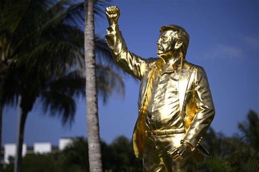 Pastor defends 22-foot golden Trump statue unveiled on golf course