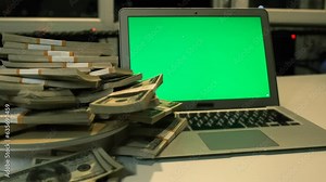 Pyramid of stacks of hundred dollar bills rotate. Many 100 dollars money cash. Financial success and abundance.