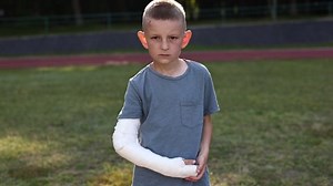 Smiling Little Boy Broken Hand Sitting Stock Footage Video (100% Royalty-free) 1092372185 | Shutterstock