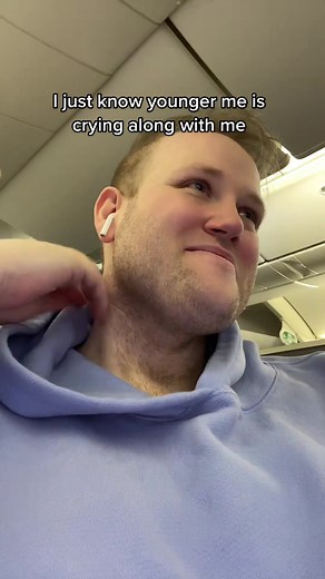 Emotional Moment on a Plane: No Seat Belt Extender Needed!