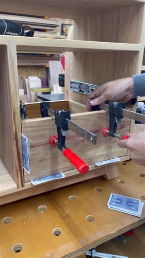 Jay Mowder on Instagram: "If you're wondering how I installed the top drawer face... double sided tape! But the first method worked good on the bottom drawer. You could also temporarily screw the face to the drawer box with the hole for the knob, then open the drawer and throw two screws in the back and then remove that temporary screw to install your hardware. #woodworking #woodshop #nightstand #drawers #igwoodworkingcommunity"