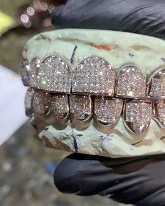🏆 The Hand Set Invisible-Set Grill with the Square “Princess Cut” Diamonds was the MVP of 2019. 💎 More expensive than its round diamond cousin, the Honeycomb set grill. The prongs holding in the diamonds are underneath each little square, hiding them, hence “invisible set” ❄️ I have the largest wholesale fine custom jewelry manufacturer in the US - inside my flagship location at 6224 Richmond Ave. Call me / Text Me at 832-846-9669 to place an order! 🤟🏼 #DiamondBoyz #InvisibleSet | Johnny Dan