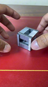 Create a box figure by stacking staples! | Russell Brown