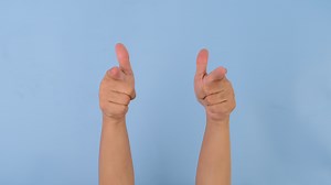 Download Female hands clapping and pointing with index finger on pastel blue background in studio. Pack of Gestures movements and body language. for free
