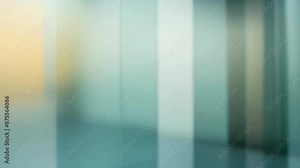 Abstract image of frosted glass panels with soft light and shadow patterns. The background features muted tones and gradient colors. This minimalist composition creates a serene and calming effect.