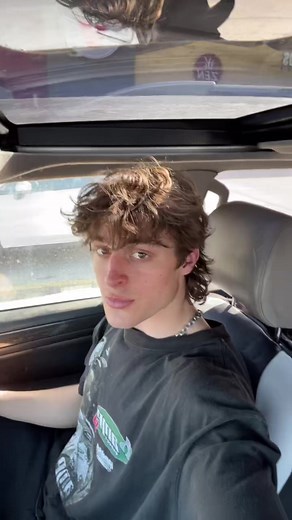 Young Male Driver Preparing to Hit the Road