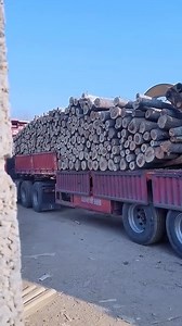 Unloading process of wood tongs- Good tools and machinery make work easy. | Discover Life