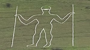 British chalk figure vandalized with face mask