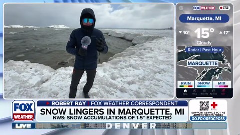 Lake Superior shoreline coated in ice following historic blizzard in Michigan