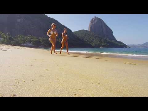 Slow motion of women jogging on a Rio beach.