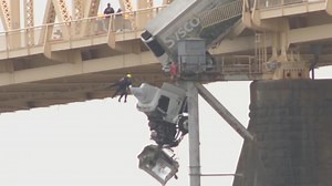 Dramatic rescue | Semi driver saved after truck dangles off 2nd Street Bridge between Louisville, southern Indiana