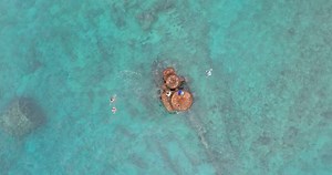 Love a little shipwreck exploring? Take an aerial tour and follow these keen locals on their lunchtime swim out to one of Rarotonga's most iconic shipwrecks, The RMS Maitai, nicknamed by locals as 'The Boiler'. Check out the link for more information: https://www.cookislands.travel/blog/shipwreck-swimming Music: My Rarotonga - Tani & Rose | Cook Islands