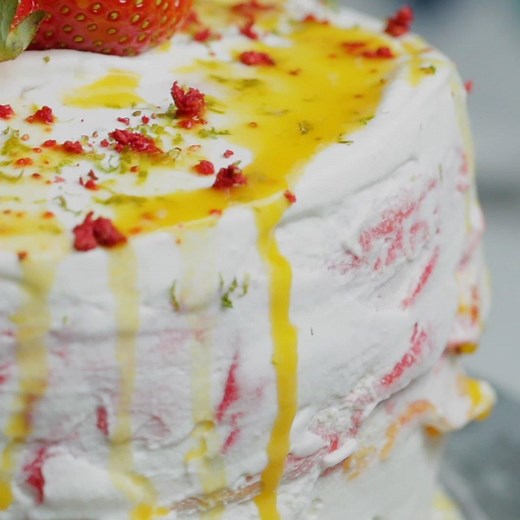 79K views · 325 reactions | Layers of passion fruit, lime, and strawberry-flavored whipped cream are stacked between vibrant layers of red-, orange-, and green-colored crepes for a dessert that’s almost too pretty to eat. Recipe: https://tasty.co/recipe/tropical-crepe-cake | Tasty | Facebook
