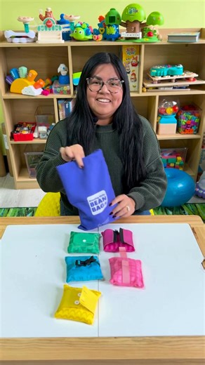 Here's a tool we use in our clinics to help with daily adaptive living skills! Our learners use beanbags designed with zippers, buckles, and buttons to strengthen fine motor skills and build confidence with everyday tasks. These tools help bridge the gap between practice and real life, making skills like dressing, fastening, and managing clothing more approachable and less overwhelming. Every child develops at their own pace, so if your child also receives Occupational Therapy, be sure to check 