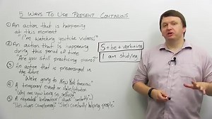 5 ways to use the PRESENT CONTINUOUS verb tense in English