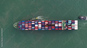 tug ship service container cargo large ship vessel to cargo international container yard port concept insurance service.