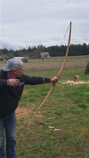 The guy who taught me to make bows shooting my most recent bow.