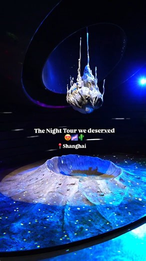 VICTORIA | TRAVEL | SHANGHAI 🇨🇳 on Instagram: "✨🌙 Night of Wonder in Shanghai 🌙✨ Embark on an extraordinary Night Tour at the Greenhouse Garden (世博温室) — where science, storytelling, and art come alive under the stars. 🌌 Follow the journey of Darwin the little robot 🤖 and Yui the space orchid 🌸, as they search for a home on Earth. Along the way, you’ll meet desert giants like the baobab tree 🌳, dance with the cactus jungle 🌵, and wander through glowing rainforests full of hidden life 🌿�