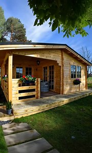Step Inside This Beautiful Pinewood Cabin with a Peaceful Porch | Log Home Designs