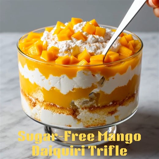 🥭🍹 Sugar-Free Mango Daiquiri Trifle A bright, creamy, tropical trifle that layers mango, coconut cream, and sugar-free sponge — like a cocktail in dessert form! 📝 Ingredients 1 sugar-free vanilla sponge cake (baked and cubed) 1 cup unsweetened mango purée 1 cup sugar-free whipped cream ½ cup coconut cream 2 tbsp monk fruit erythritol blend 1 tsp rum extract (optional) 1 tbsp lime juice ½ cup diced fresh mango (for topping) 👩‍🍳 Steps to Create In a bowl, mix mango purée, lime juice, sweetene
