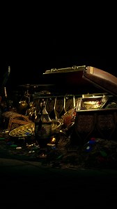 Open treasure chest with gold coins