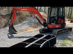 Installing new Camso tracks on a Kubota U55-4 mini excavator