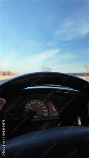 Driver driving a car. First-person view. POV. Slow motion video. Person driving a car. Traveling. Bad road.