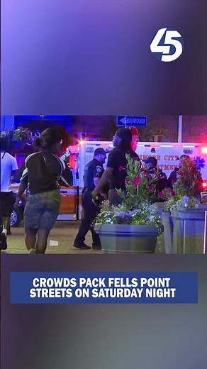 Large crowds filled the streets of Fells Point Saturday night, with a visible police presence