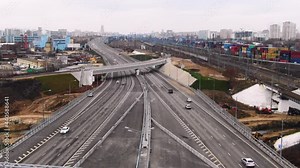 Multi-lane pathway. The road near the inhabited locality. Construction of a new pavement near the city top view