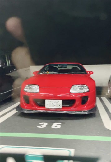 All the sightseers, all the cameras, driving through Japan parking garage car meet like a glamorous star. #jdm #cars #travel #pov #japantravel