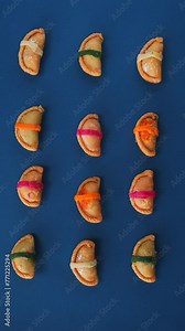 Stop motion of premium Indian sweets in portrait