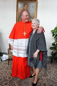 Timothy Dolan hugs mother after becoming cardinal; siblings beam with pride