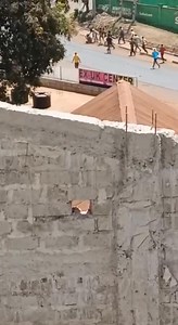 Police officer in Embu town beaten to a pulp after his colleagues fled from an angry mob during Gen Z led demos. 🎥: Courtesy | Classic 105 Kenya