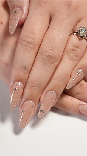 27 reactions | Can’t pick between nail designs with gems or glitter...