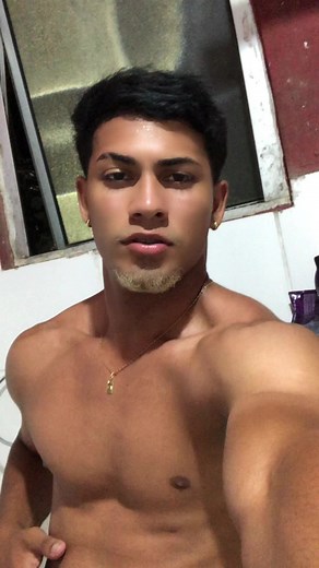 Showcasing Impressive Muscle Definition in a Bathroom