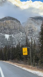 Wrapped in clouds, carved in stone. Another day, another jaw-drop in Banff. #scenery #ExploreAlberta #CanadianRockies in Banff National Park 🏞️ Alberta, 🇨🇦! | Nap Napuli