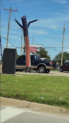 Inflatable Tube Man at the Car Shop