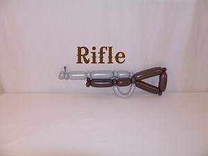 Learn how to make a balloon animal rifle or gun using balloon twisting