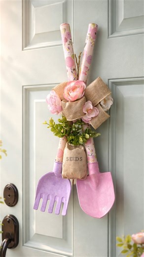 She turned toy Dollar Tree garden tools into the cutest spring wreath. A creative way to decorate for the season without spending much. What colors would you use? | Crafty Beach