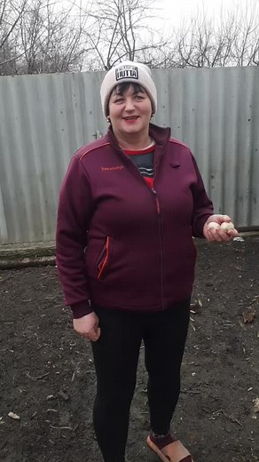 Demonstration in a Maroon Jacket and Outdoor Setting